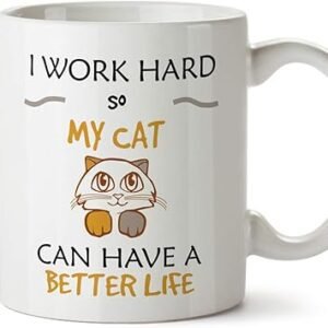 A Kitten Mug in white showcases the phrase "I Work Hard so My Cat Can Have a Better Life," accompanied by a charming illustration of a cat with orange and brown paws.