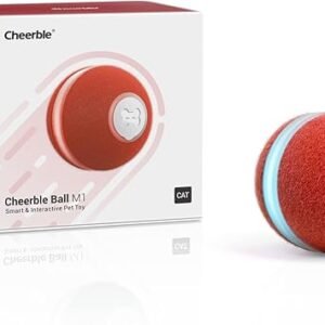 The image features a Puzzle Toy for Indoor Cat, an intelligent interactive toy ideal for indoor felines. The red ball, decorated with a silver emblem and light blue stripe, is positioned next to its packaging. The box emphasizes the ball's design along with branding text.