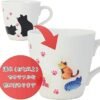 This Colour Changing Mug features lively cat illustrations that change with heat, as suggested by an arrow. The surface is embellished with pink paw prints, and a red circle contains Japanese text explaining the color transformation at temperatures exceeding 45°C.