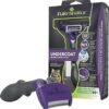 The Furminator Undercoat Deshedding Medium/Large for long-haired cats is shown with a purple and black handle next to its packaging, which features product information and a cat image.